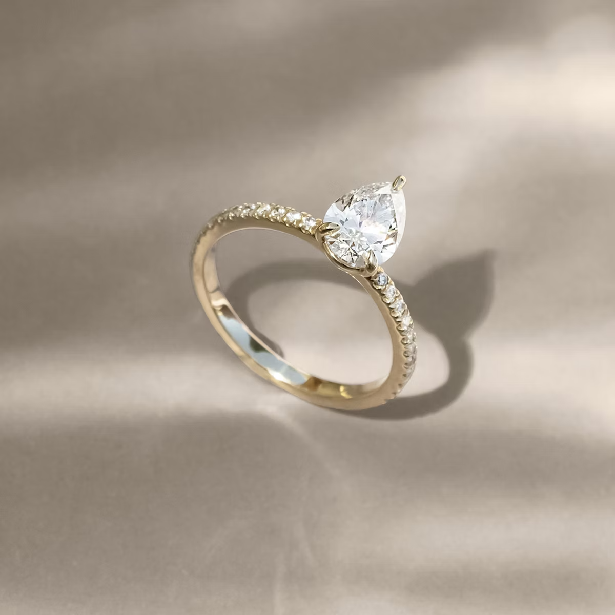 The Signature Pear Engagement Ring in Pave Standard Band