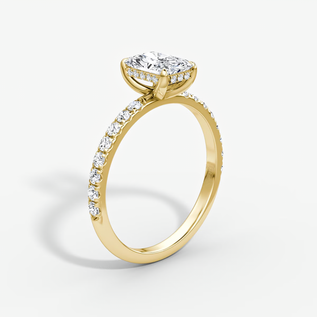 The Classic Hidden Halo Radiant Engagement Ring in Pave Standard Band