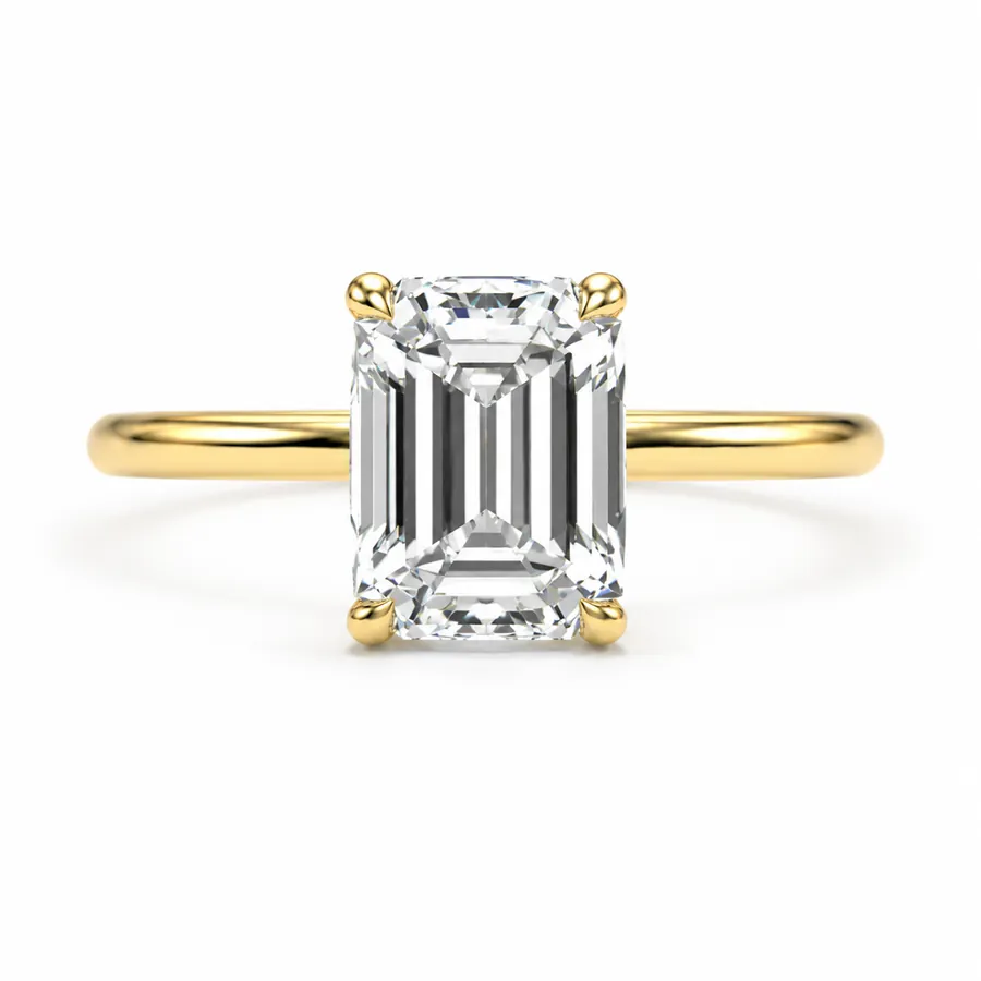 The Vivienne — Emerald engagement ring in yellow gold