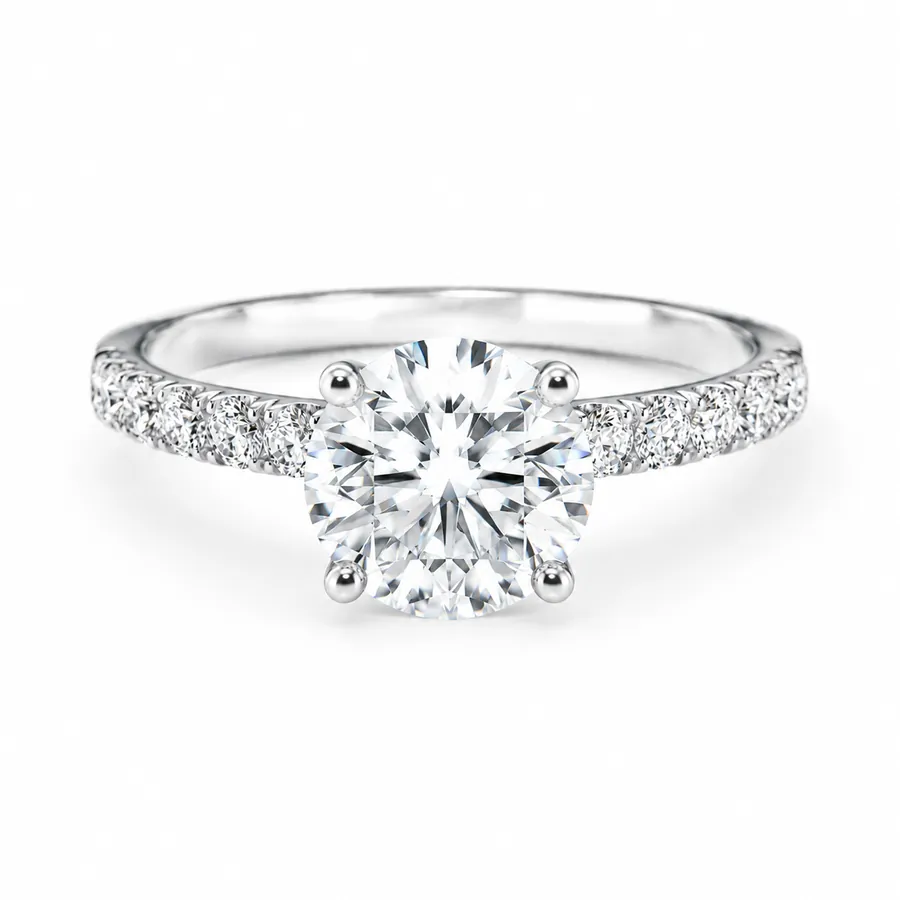 The Whisper — Round brilliant engagement ring in white gold